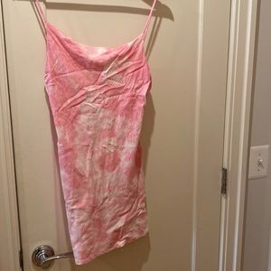 Tie dye pink mini dress with cute button details on the back